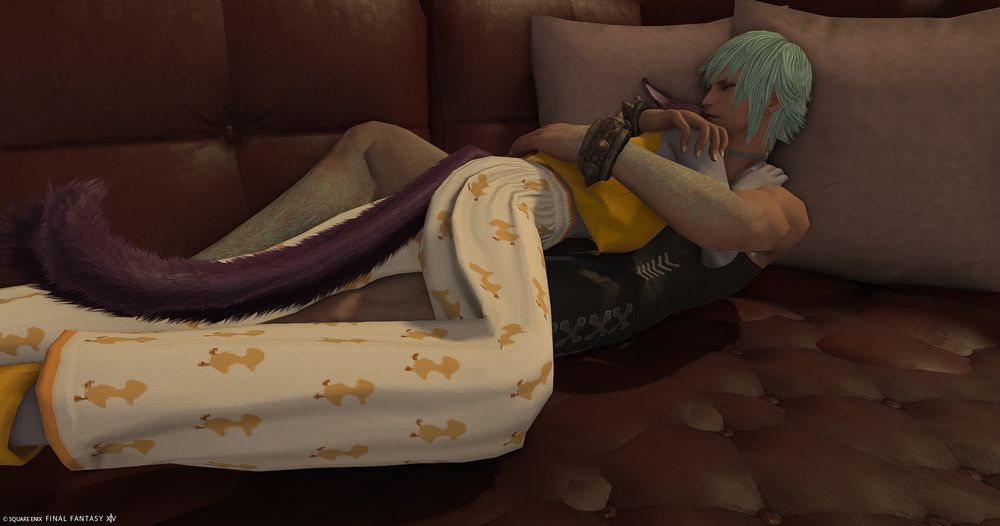 gpose of cisone (a miqo'te wol from ffxiv) and sicard (a hyur npc) taking a nap on a leather couch pit recessed into the floor. cisone's is wearing a loose yellow top, emmanellain's chocobo pajama pants, and yellow slippers. sicard is wearing the base hempen underclothes and still has his pointy bracelets on. cisone is sleeping on top of sicard while he has his arms cozily wrapped around her