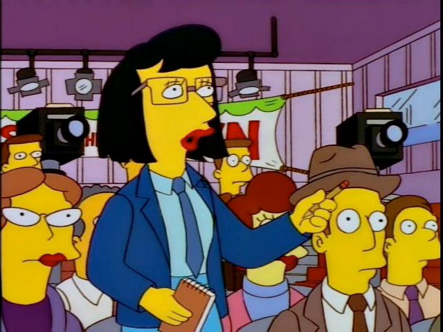Female reporter at a press conference asking, "Why now? Why not 20 years ago?" from the Simpsons.