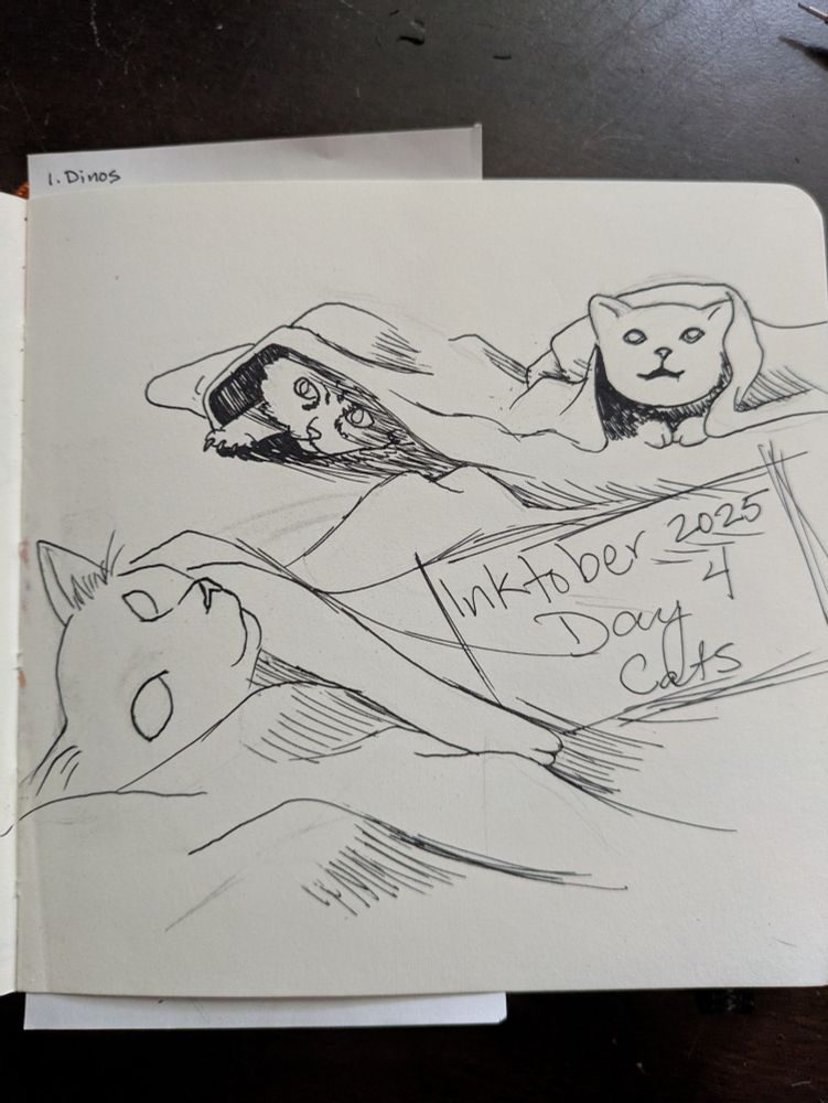 Ink drawing of a few poorly drawn cats hiding out in blankets.  One is lounging, one is ready to attack and one has both paws in front of itself.  Bends and folds all over.  Text reads "Inktober 2025 Day 4 Cats".  