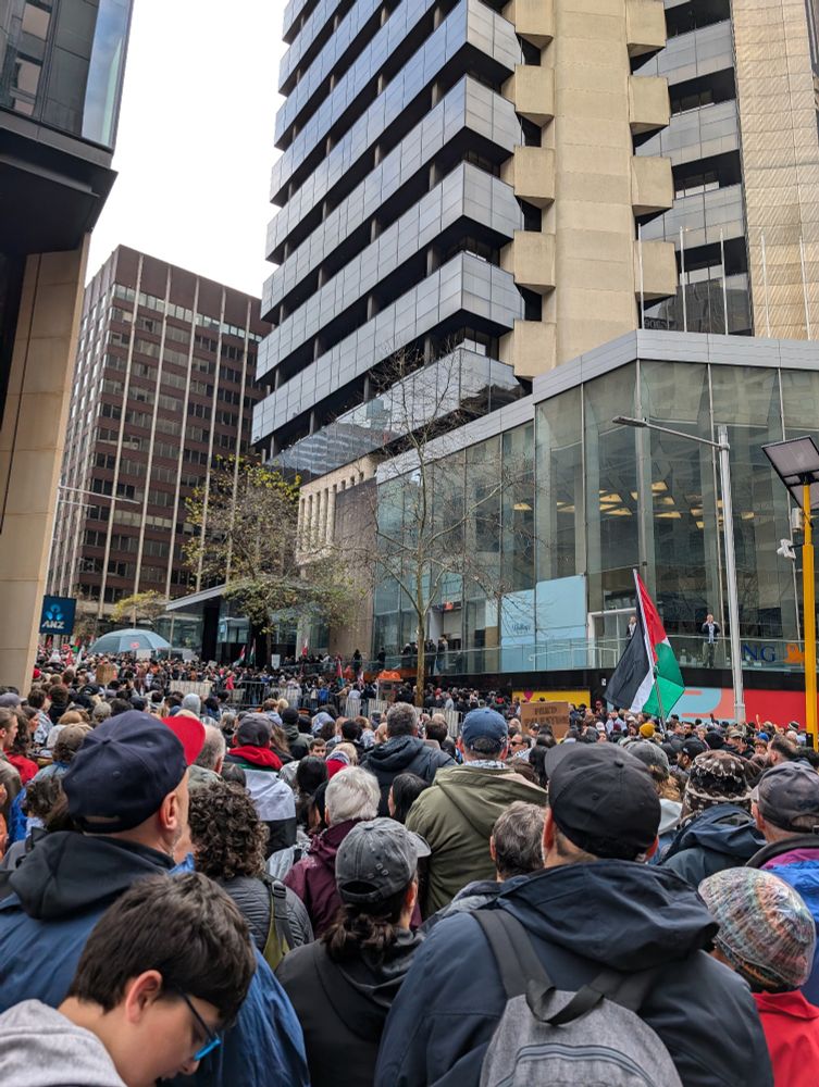 thousands of protesters filling Margaret St, two streets walk away from Lang Park where the march is meant to start 