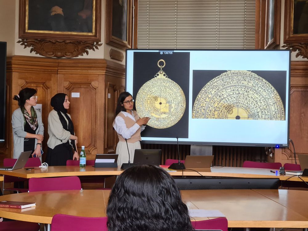 Johanna Garzon, Afra Akyol and Maedeh Hosseinzadeh presenting on astrolabes at the Paris Observatoire.
