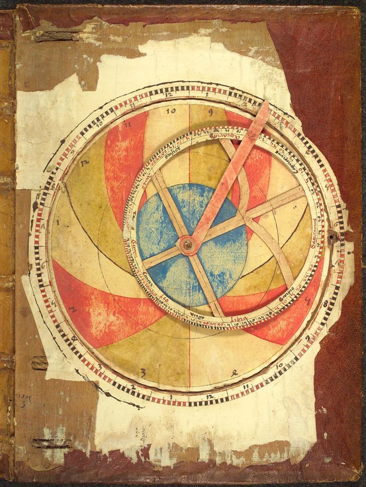 Handcoloured paper astrological astrolabe pasted onto the inside of the wooden back cover of the “Heidelberger Schicksalsbuch” (Book of Fate), dating from after 1491. Universitätsbibliothek Heidelberg, Cod. Pal. germ. 832 (http://digi.ub.uni-heidelberg.de/diglit/cpg832/0560). 