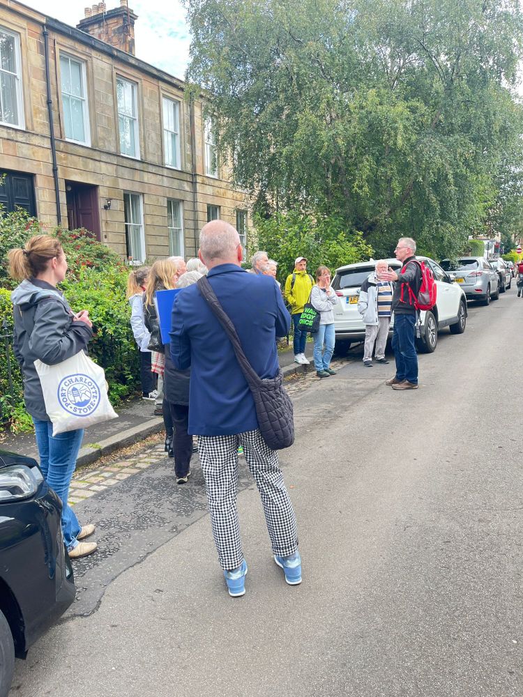Me pontificating nonsense to the tour participants in Regent Park Square
