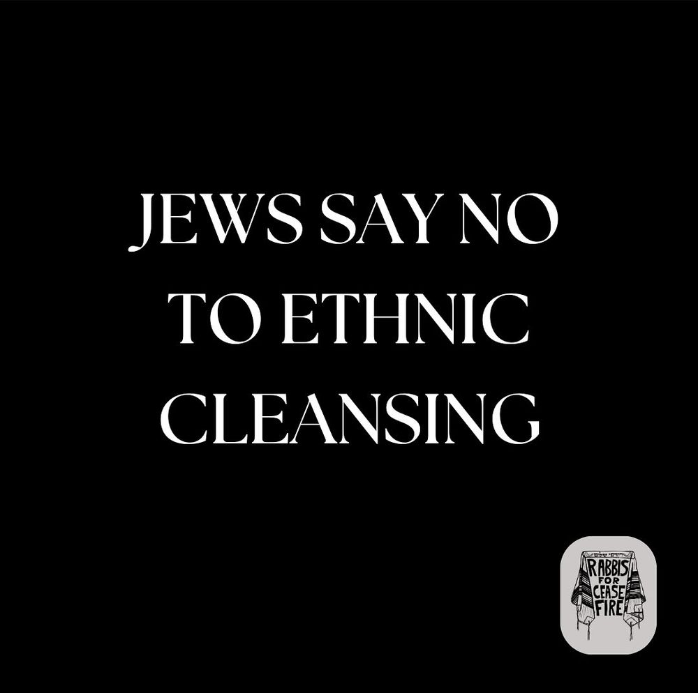 Black banner that says in white letters: "Jews say no to ethnic cleansing"