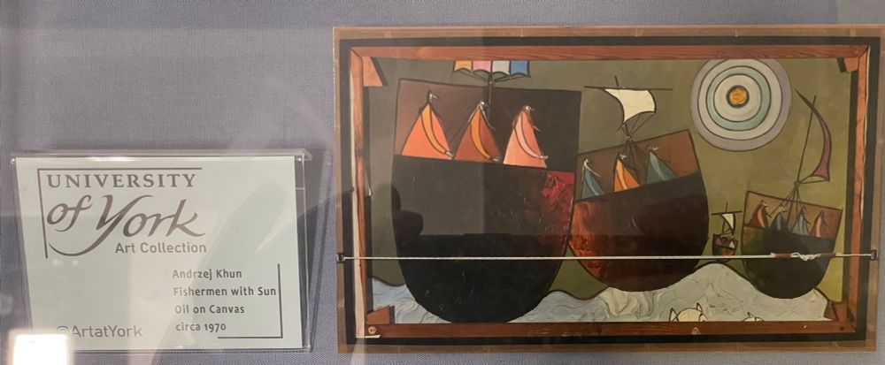 Oil painting of fishermen in a boat by Andrzej Khun which appears to have been painted on the back of the canvas because the hanging string is on the same side as the painting. 