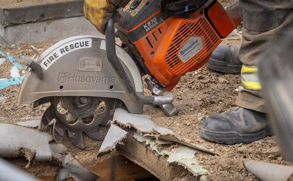 Close-up view of a Husqvarna K970 rescue chainsaw with 