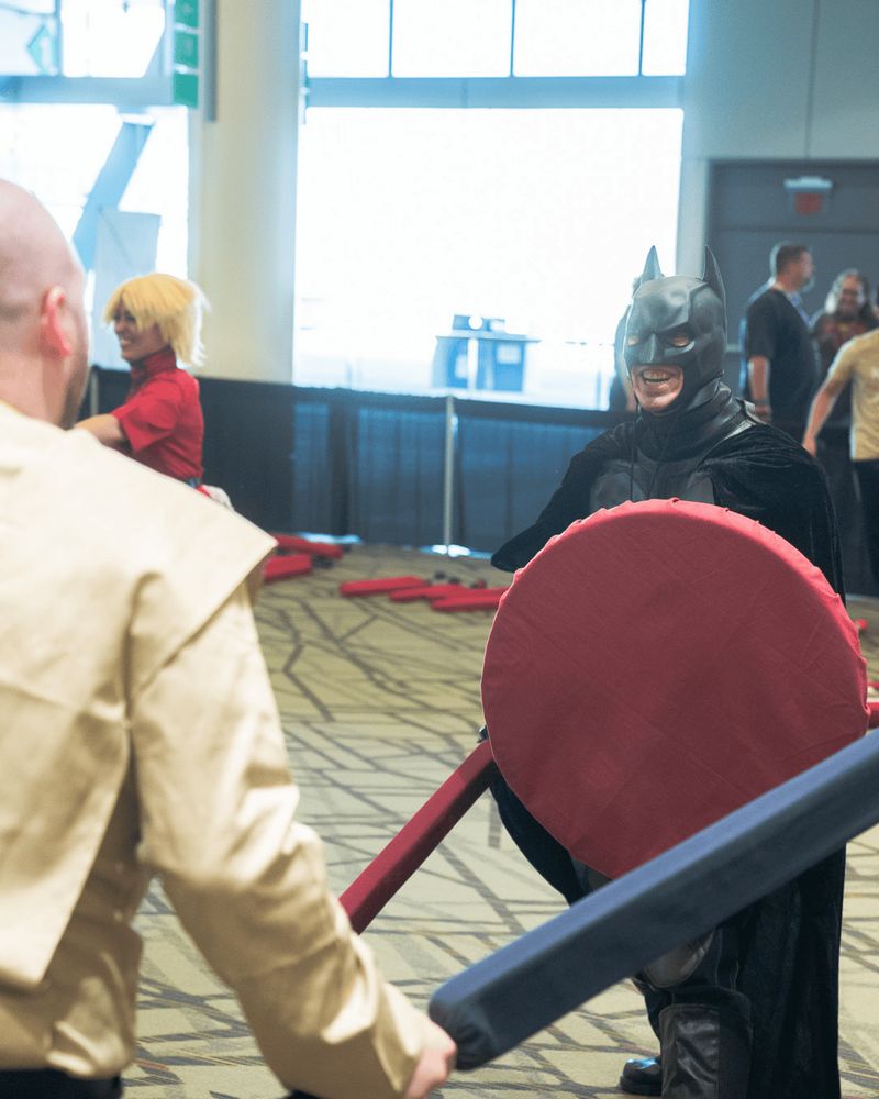 Batman Fighting a Jedi