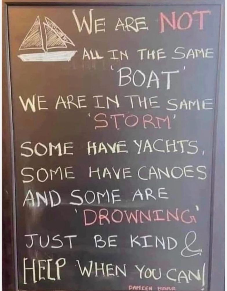 Sign reminding us to be kind to each other and help when we can. 