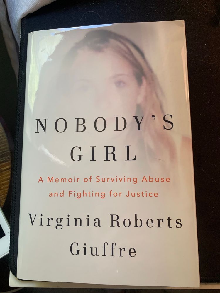 Cover shot of ‘Nobody’s Girl’, Virginia Roberts Giuffre. Photo shows a beautiful girl being erased. 