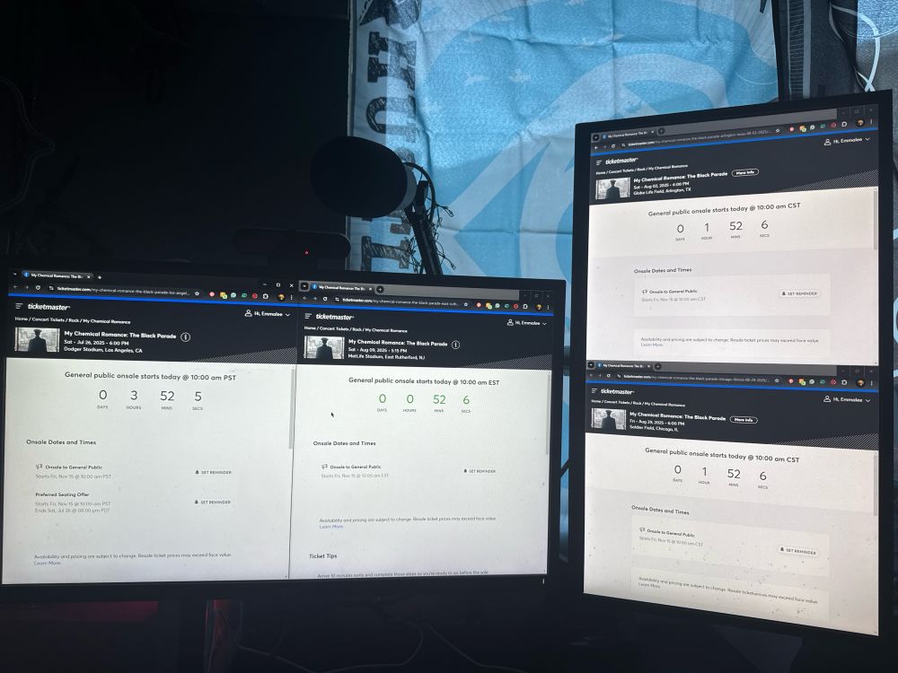 2 monitors both split in half with a different ticketmaster queue page for a My Chemical Romance show. Left to right is LA, NJ, TX, IL