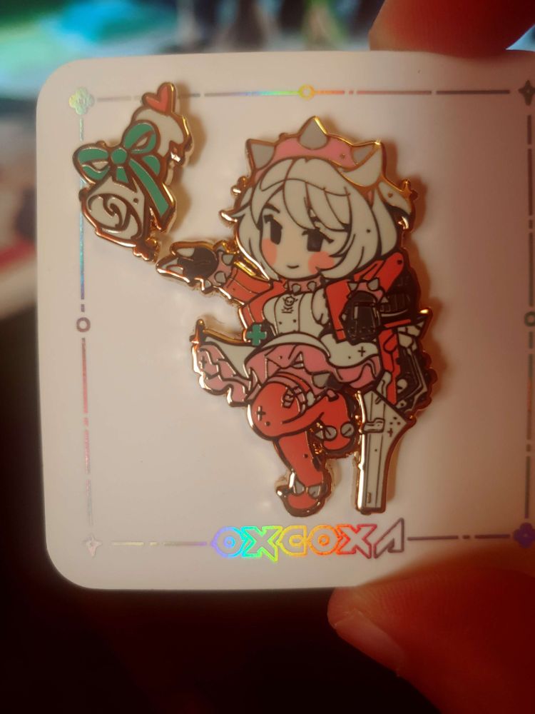 A pin of Elphelt on a card, hand drawn by Oxcoxa.