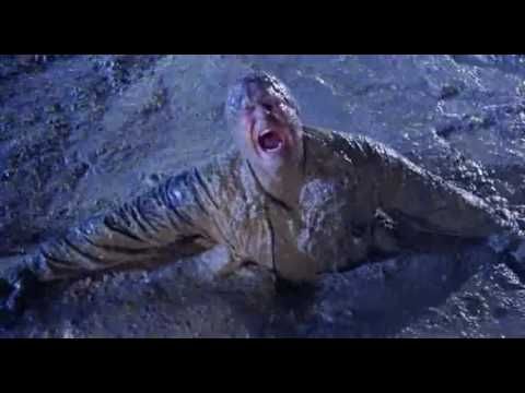 John Goodman bursting out of the bluish-brown muddy ground in Raising Arizona, bellowing like a madman freed