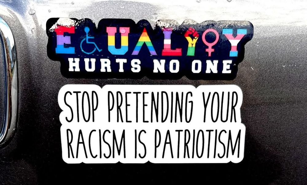 Sticker that reads "Equality hurts no one. Stop pretending your racism is patriotism"