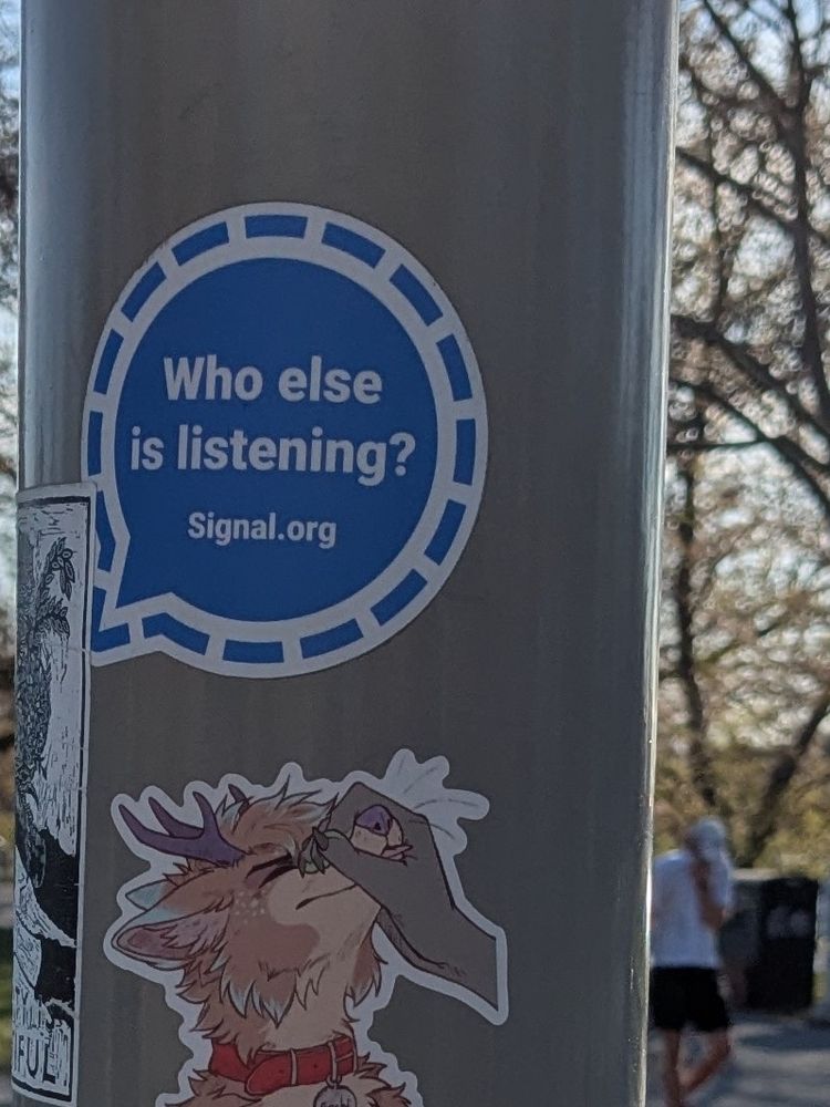 Sticker ad from Signal that says "Who else is listening"?