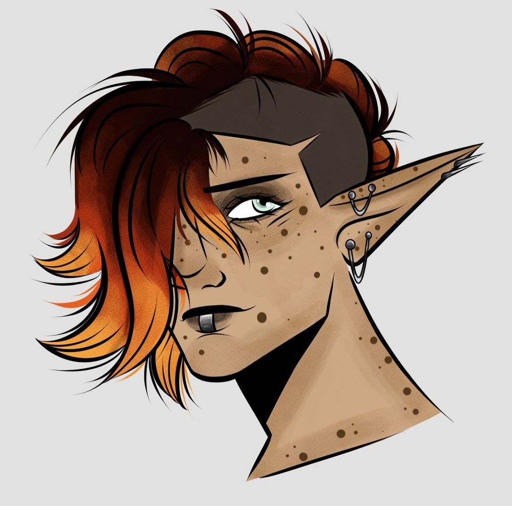 A shoulders-up drawing of a character with tan skin and long pointed ears. They're freckled, with light green eyes and dark make up. They have both mouth and ear piercings. 

Their hair is half shaved and brushed to the side. Its dyed to resemble flames. 