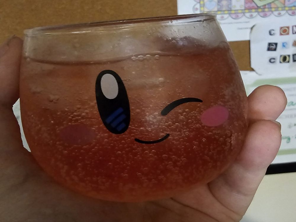 Kirby glass filled with alcohol because I'm day drinking