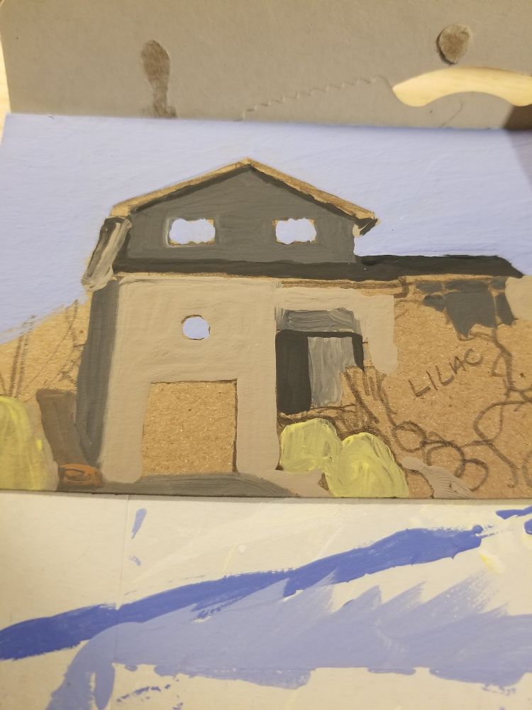 A home in greys and taupe against a pale blue sky. Only colour blocking, without greens or details with some pencil lines and notes visible