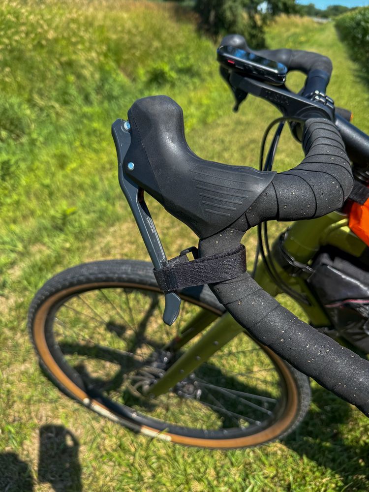 Velcro strap for your front brake to prevent your bike from rolling 