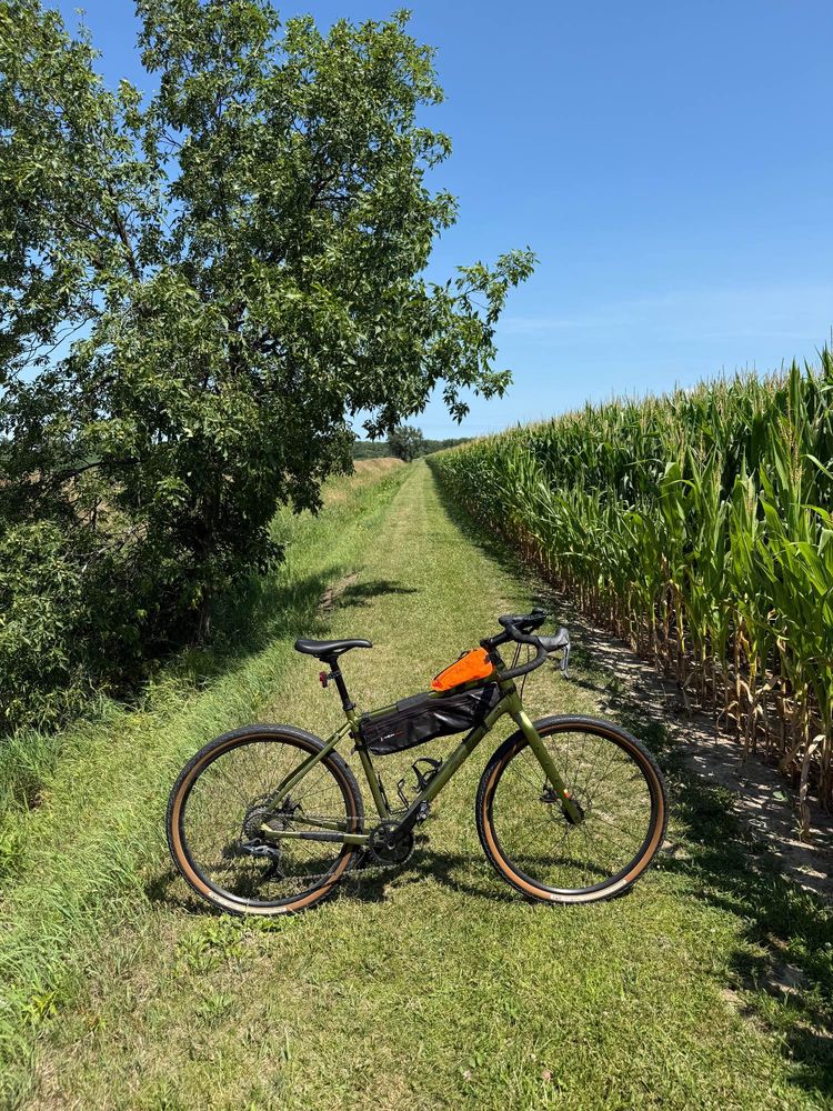 My gravel bike leaning on a private farm trail. This trail is 7 miles. It alternates between grass and gravel two track. 