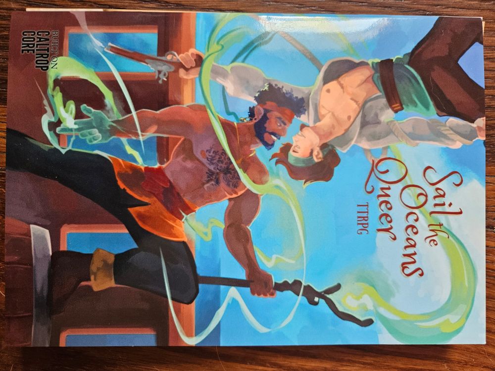 Photo of cover of ttrpg Sail the Oceans Queer