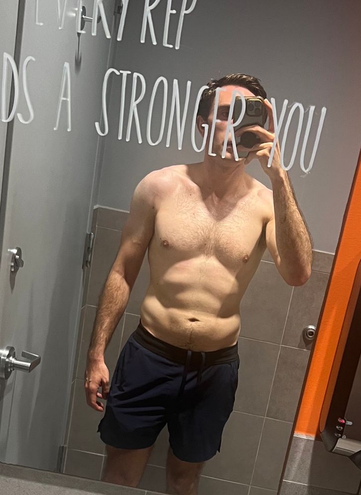 A handsome young man after a sweaty workout