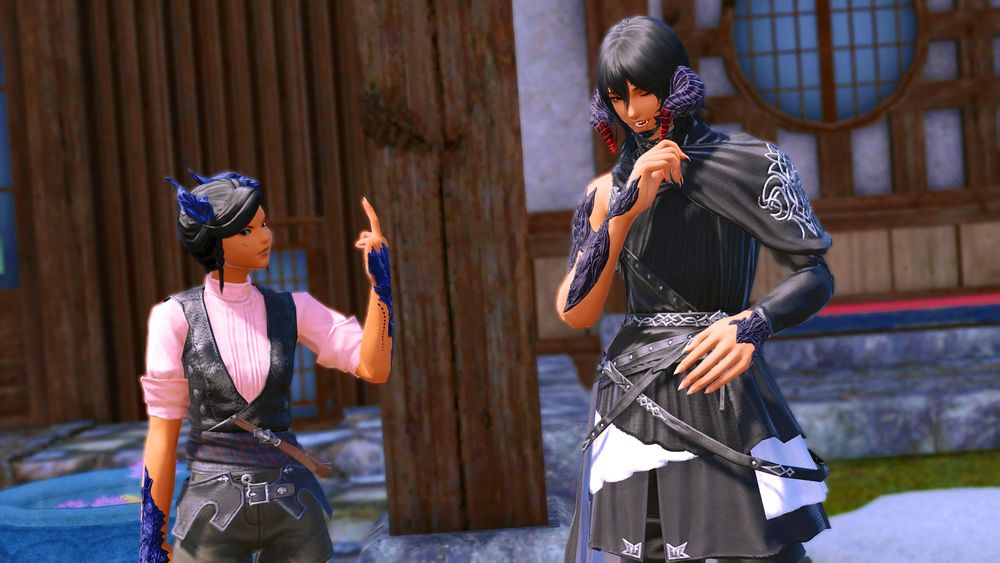 Saran and Tuya, much older. Tuya is flipping Saran off while they laugh at her.