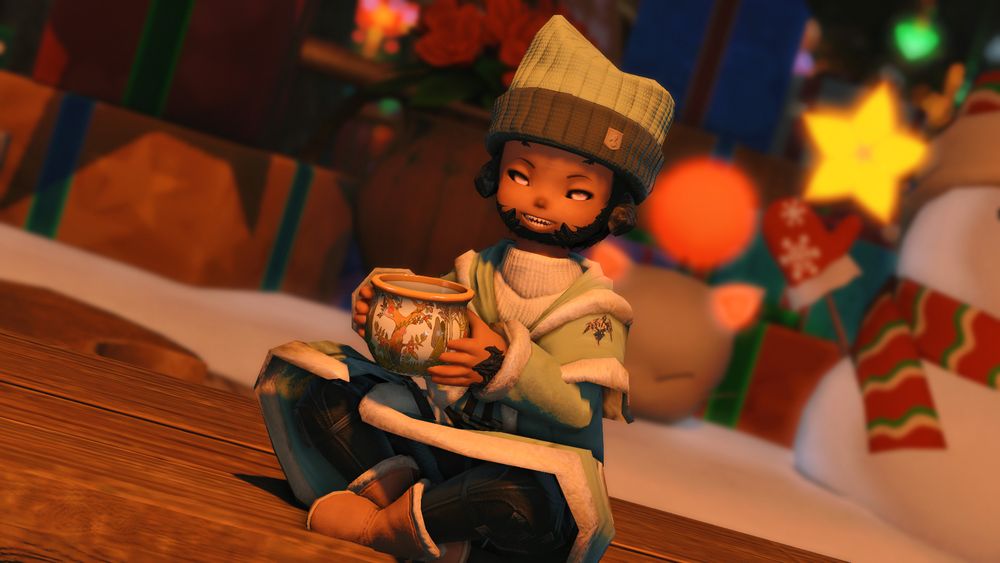 Baby Saran dressed in winter attire and holding a warm drink