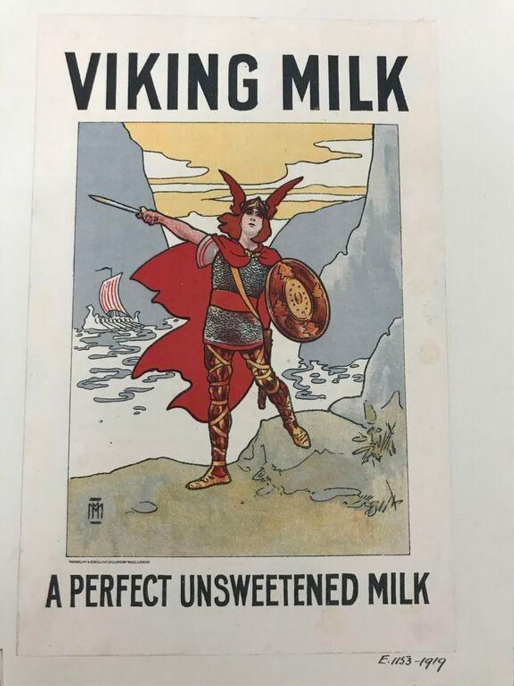 Colour lithograph pictorial advertisment depicting a female Viking or valkyrie figure with a red cloak and winged helmet, wielding a shield and a sword. There's a white sea behind her- is it milk? Is it her milk? Many such questions.
Signed with the monogram MM.