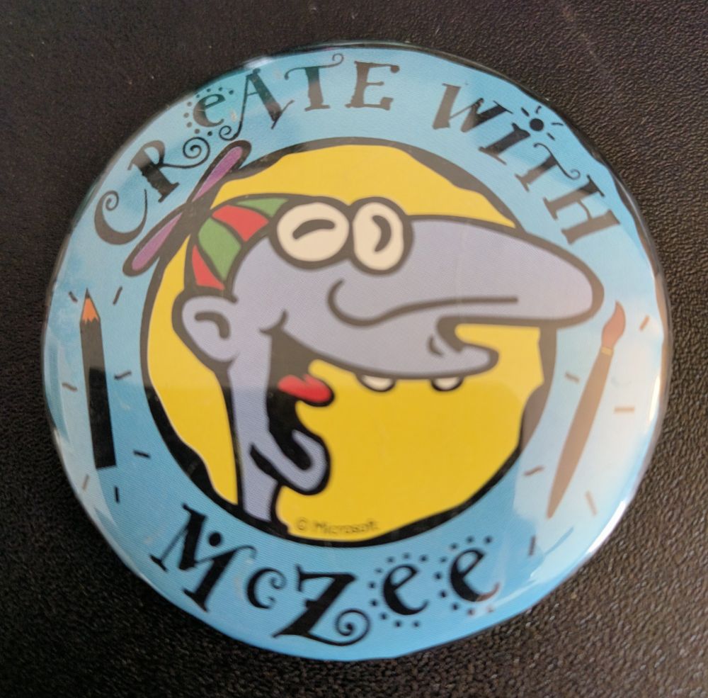 Button pin of McZee, the mascot for 3D Movie Maker from Microsoft, with the text "CREATE WITH MCZEE" in a font that deserves more love.