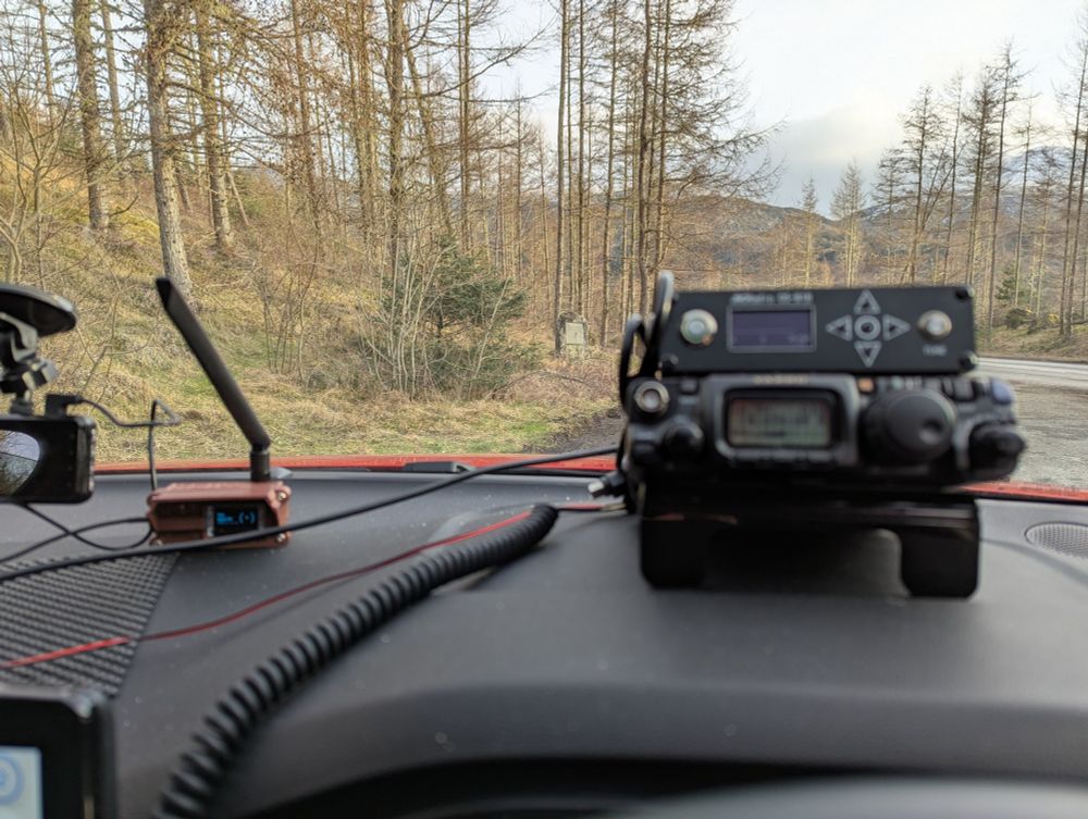 Yaesu ft 818 radio next to a heltastic V3 meshtastic radio