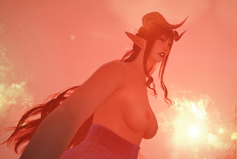 A three-quarters shot of a Duskwight elezen with long black hair and short pointy horns on their head. Fire swirls about them. They look incredibly angry, daring anyone to challenge them. Their chest is bare though they are wearing a skirt still. 