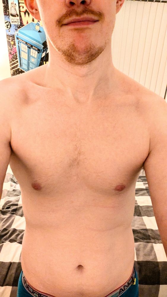 Selfie close up on my naked chest and torso, and mouth