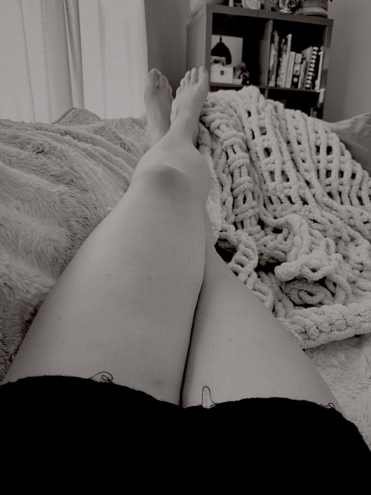 Dahlias legs crossed and up on the back of the couch. In monochrome for monochrome Monday. 