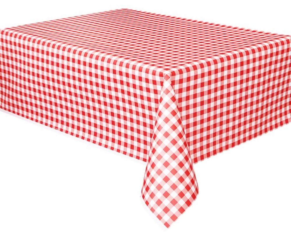 photo of a tablecloth with white and red squares on a white background.