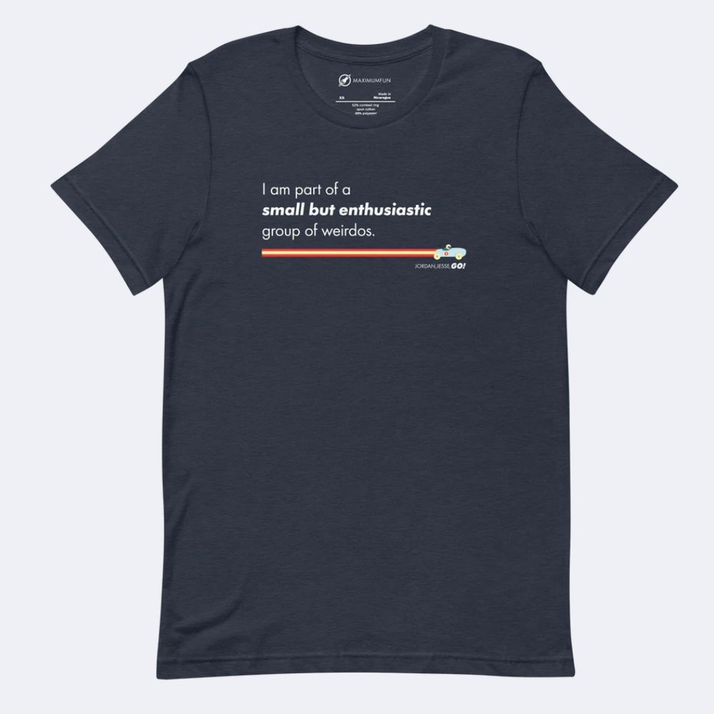 Navy blue T-shirt with the Jordan Jesse Go racecar logo on it, under white text reading "I am part of a small but enthusiastic group of weirdos."