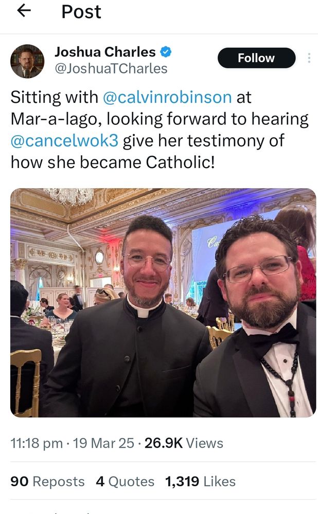 Cosplaying Cleric Calvin Robinson in a priests frockcoat