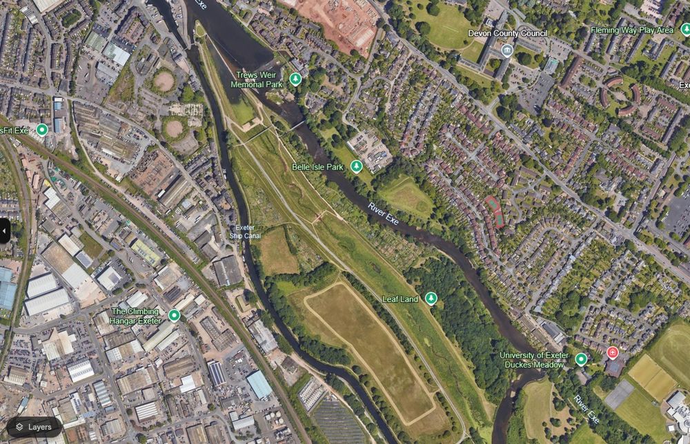 The flood channel in the year we moved here. The stream is hard to see because it's covered in vegetation, particularly near where it meets the Exe again in the south. The little forest on the East side is now fully covered in tree foliage. There's no good imagery yet from 2025 so you'll have to take my word for it that it's better now.