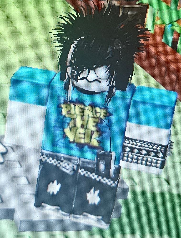 His amazing OC (yes, he made it in roblox, he is ass at drawing so..)