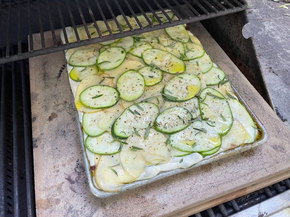 Focaccia on pizza stones in a gas grill 