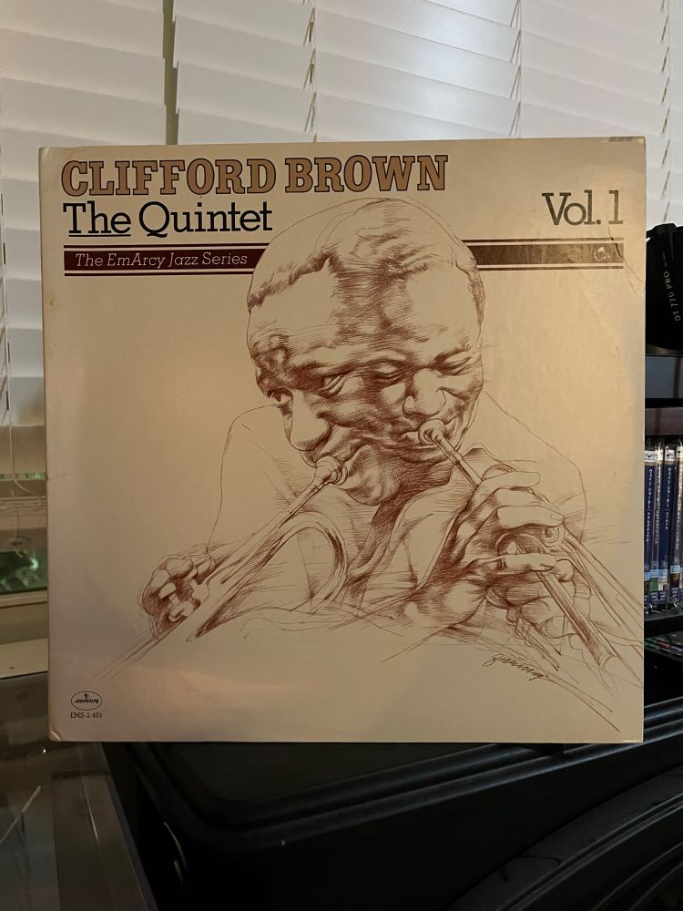 Record cover of Clifford Brown: The Quintet Vol. 1, featuring a brown pen drawing of two angles of Clifford Brown playing trumpet against a white background.