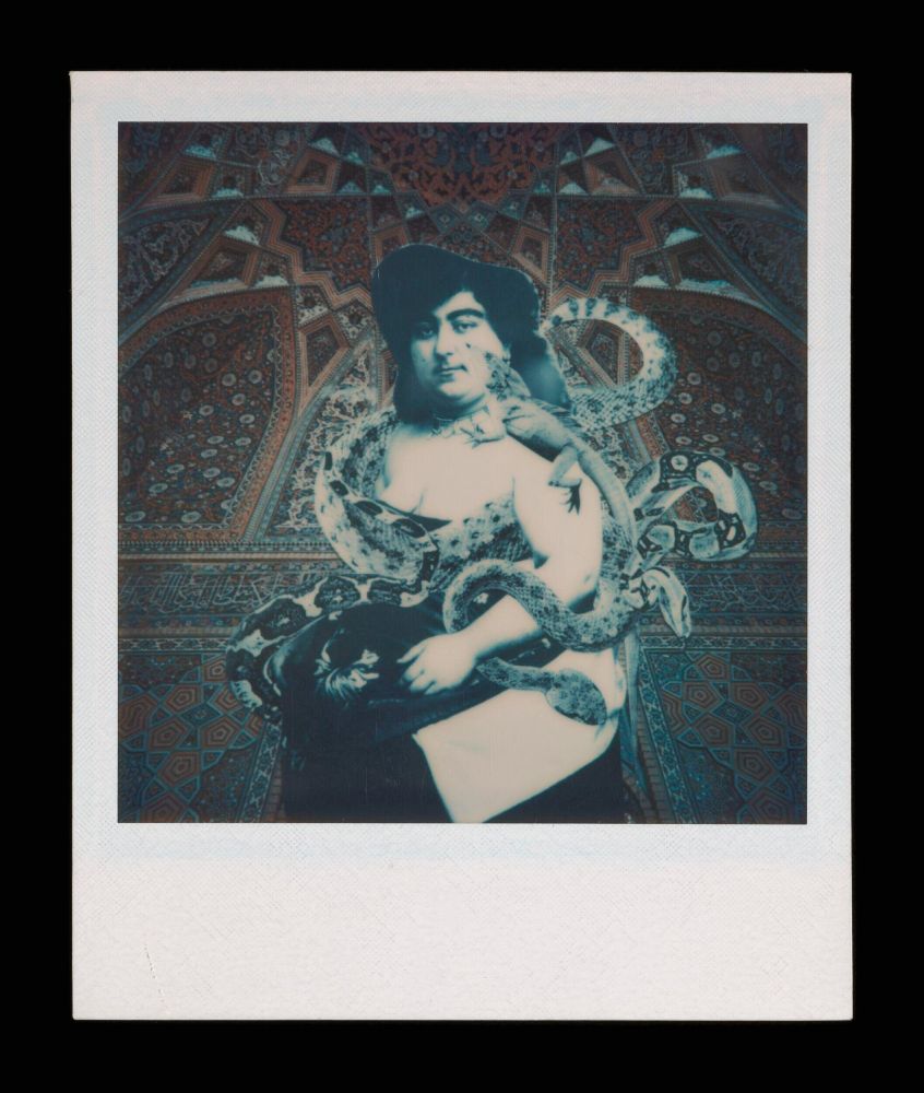 A polaroid photograph showing an Iranian woman (Taj al-Saltanah), with snakes coiled around her. In the background, a tiled portal of a mosque or similar building.