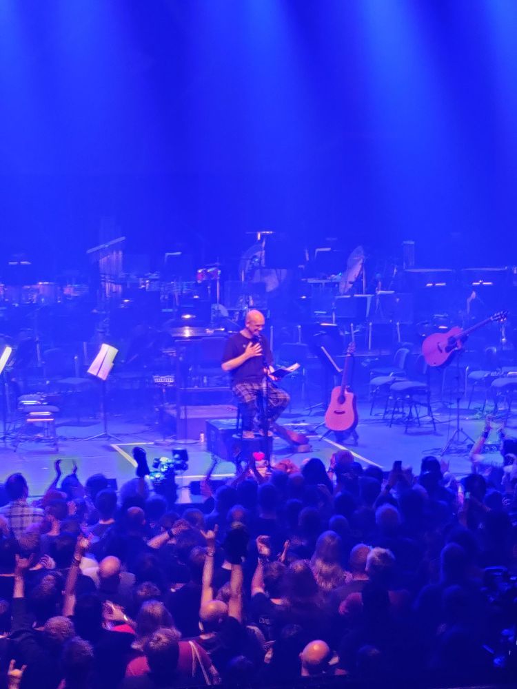 Devin Townsend in his pyjamas and comfy shoes on the stage 