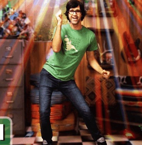 link neal hitting a pose with his arm up