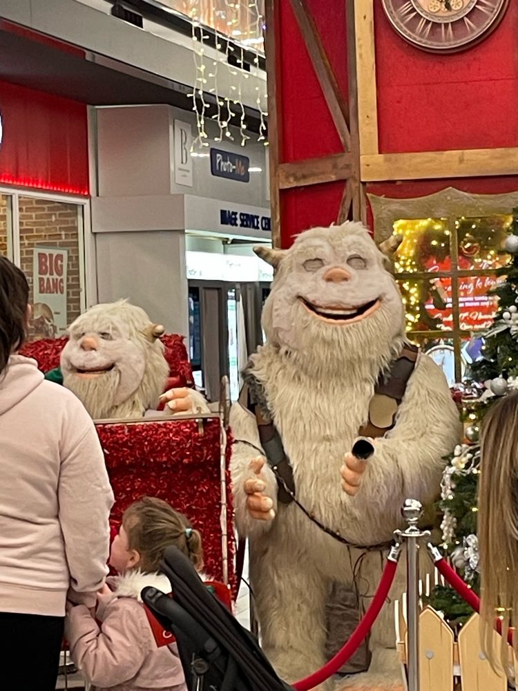 Two goofy looking animatronic yeti’s at Santa’s Grotto 