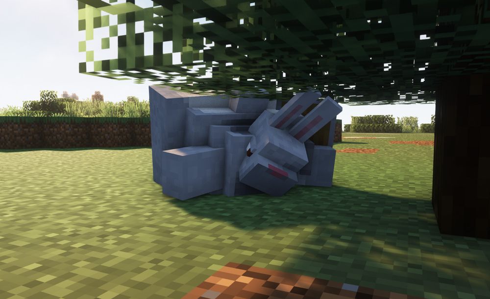 A 'Minecraft' screenshot. The player  character (an extremely obese anthropomorphic grey rabbit) is wedged belly-down underneath a tree. Their head is partially lost in their very large neck fold, and their increasingly-wide back rolls are visible.