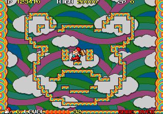 Screenshot of a video game. A little character has climbed halfway up a set of walls which resemble a cartoon face. READER'S VOICE: Is that Biffo the freaking Bear?