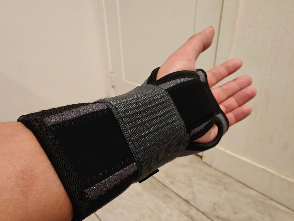 Photo of the user's arm with a wrist brace.