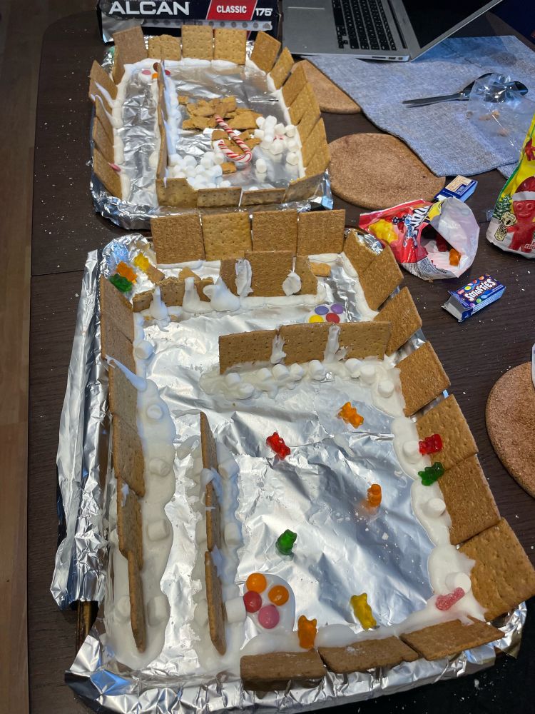 An inexpertly made Dungeons and Dragons dungeon made of graham crackers and icing. It has sour patch kids and gummi bears scattered throughout for enemies.