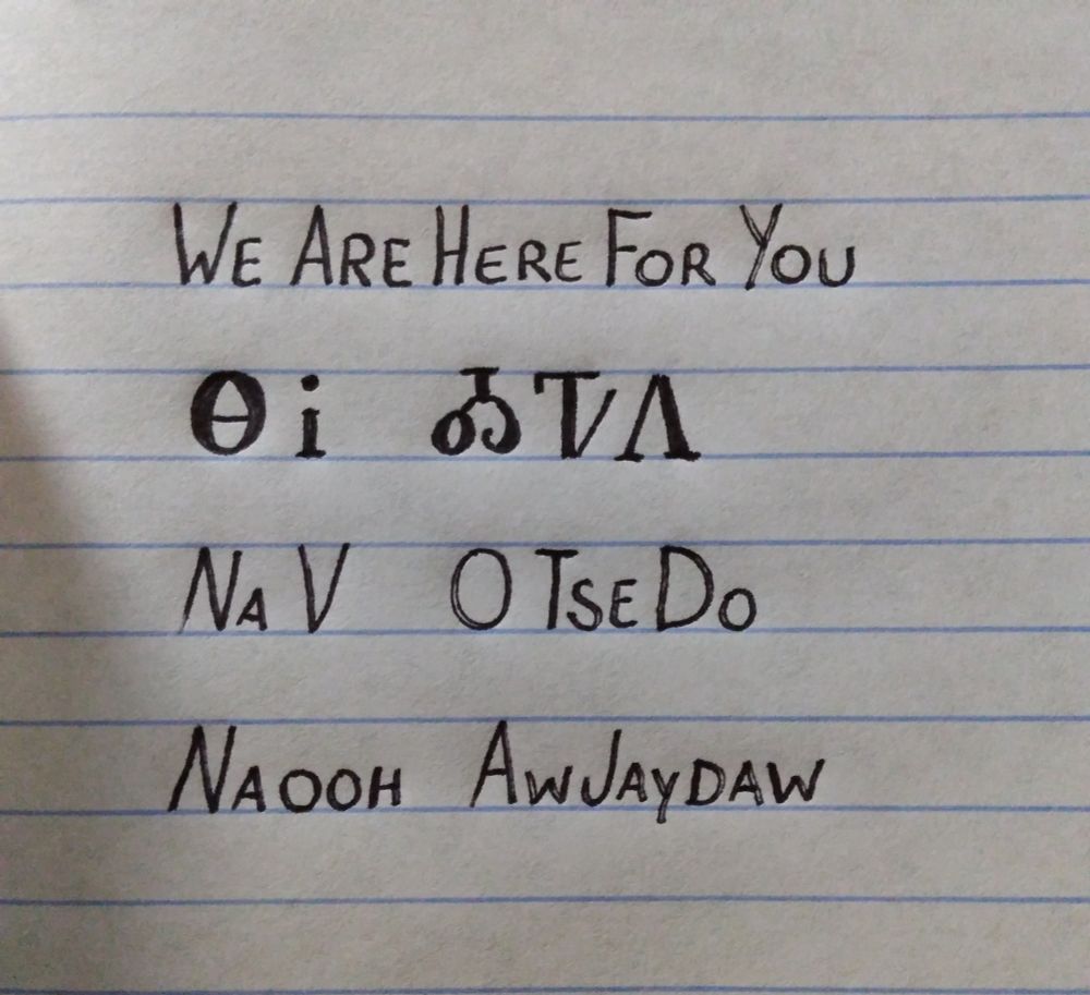 Image is line paper with writing showing an English word followed by how it is written in the Cherokee language followed by how it is spelled and pronounced. The words are we are here for you and pronounced na-ooh awjaydaw
