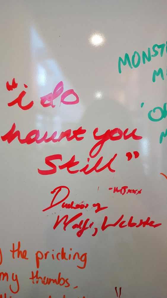 Whiteboard with handwritten quotes on it. The focus is on a quote by Webster from the Duchess of Malfi. The quote reads:
'I do haunt you still.'